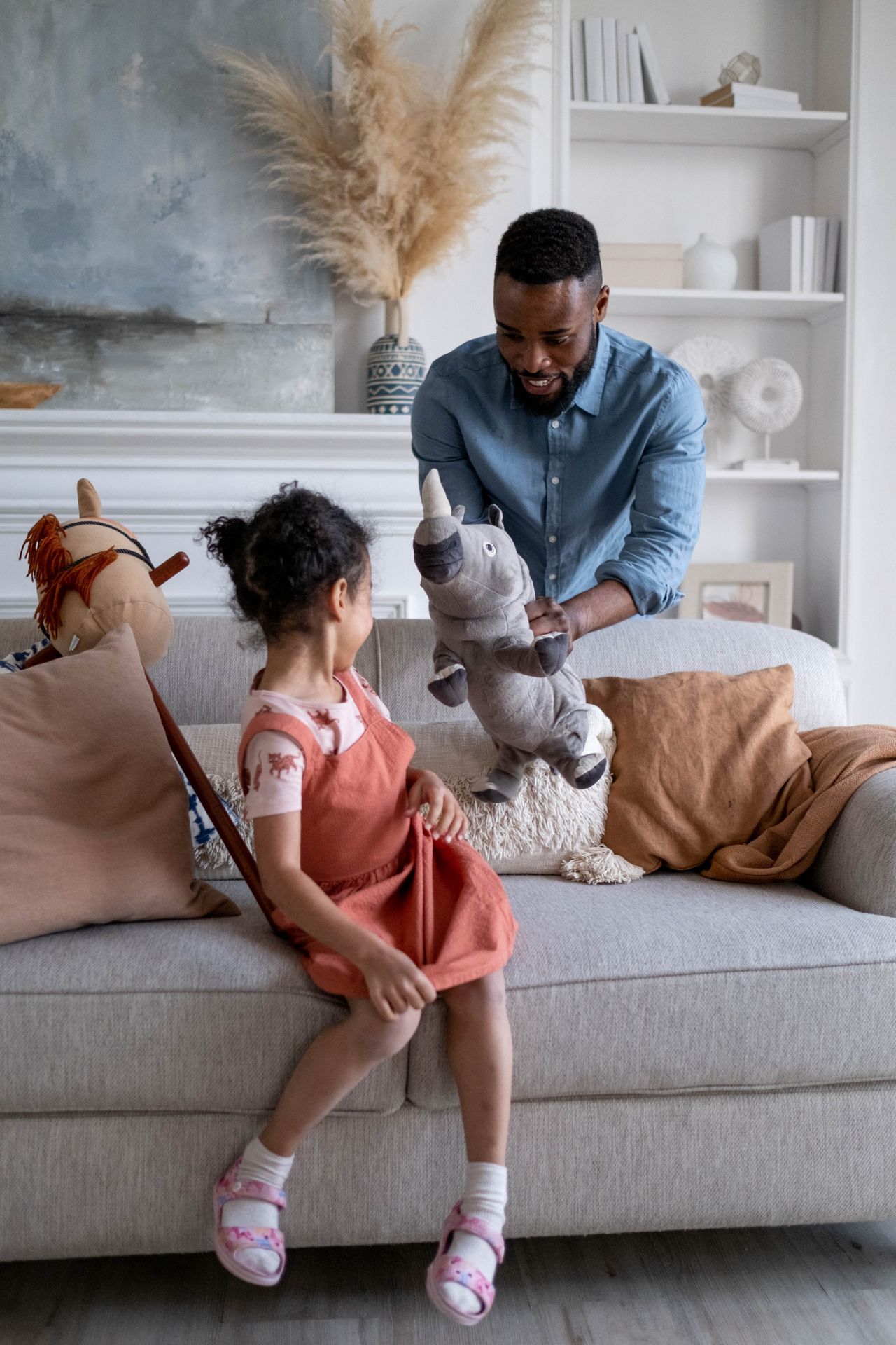Father and Child Playing with Premium Plush Rabbit Toy at Home - Family Bonding Moment